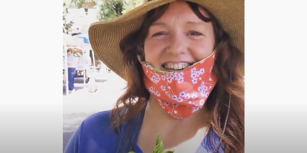 Shannon Schnibbe, Parma! founder, enjoying Getting Farmers Market Greens
